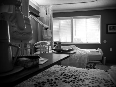 Empty hospital bed after death